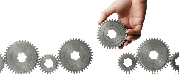 A hand holding gears